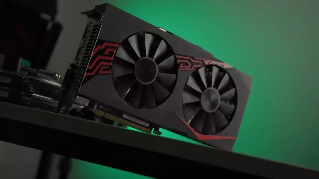Видеокарта Radeon RX 570 с двумя вентиляторами и зелёной подсветкой
